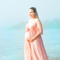 Portrait of a pregnant woman standing by the sea Expecting mother portrait by the sea – New York maternity photography