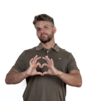 Playful studio portrait with engaging gesture. Studio business portrait of man pointing at camera – advertising photo